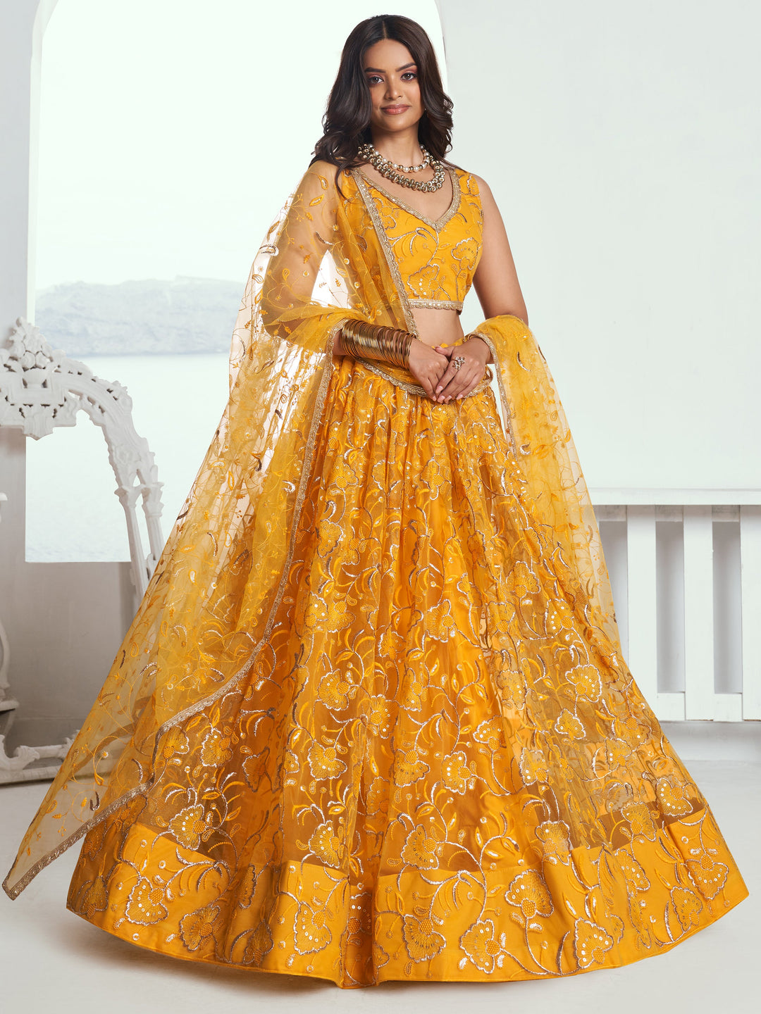 Attractive Yellow Embroidered Net Wedding Lehenga Choli With Dupatta