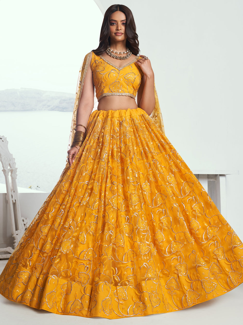 Attractive Yellow Embroidered Net Wedding Lehenga Choli With Dupatta