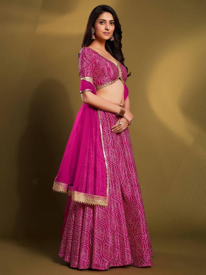 Customizable Pink Bandhani Lehenga Choli | Crepe with Sequin Borderwork for Weddings