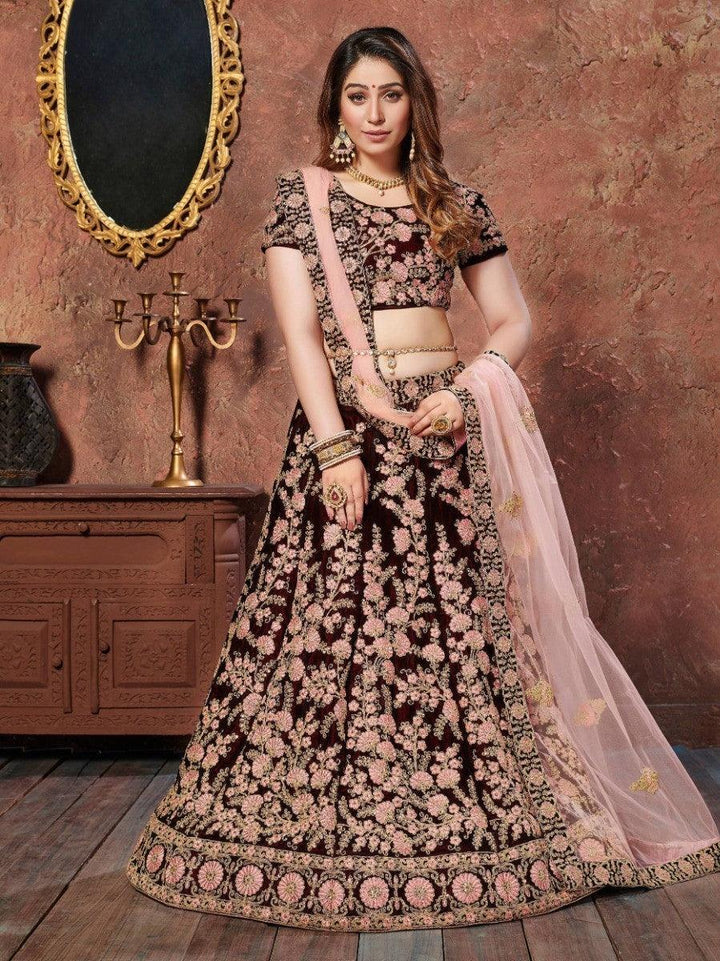 Maroon velvet lehenga with dori and sequins work, perfect for weddings