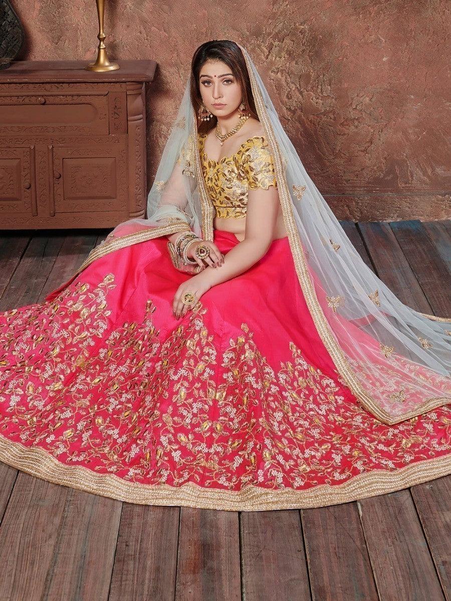 Traditional pink wedding lehenga with matching embroidered choli