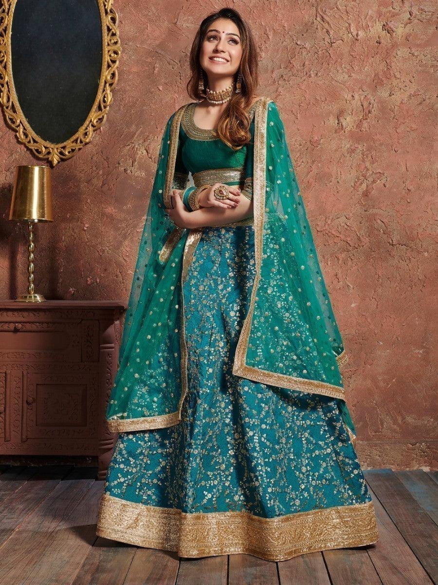 Traditional teal wedding lehenga with heavy gota lace and zari work