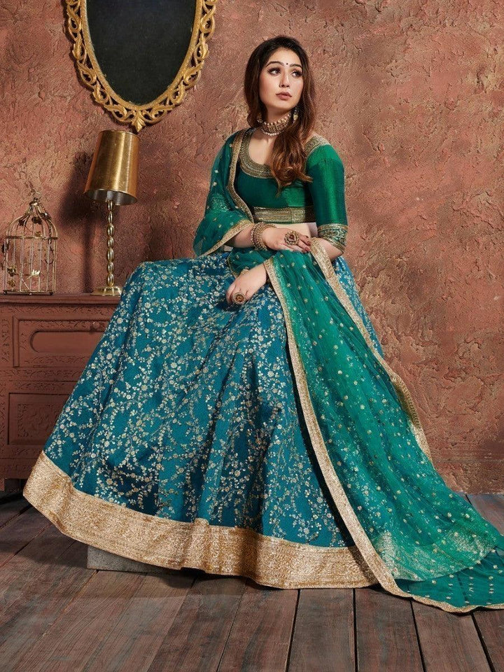 Elegant teal green lehenga with art silk fabric and sequins detail