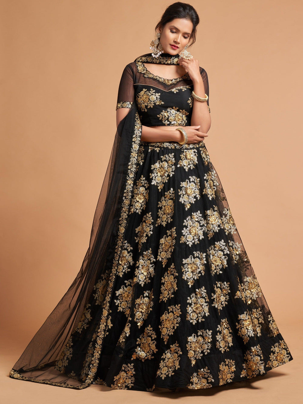 Elegant black lehenga choli with soft net blouse and santoon inner, ideal for ceremonies.