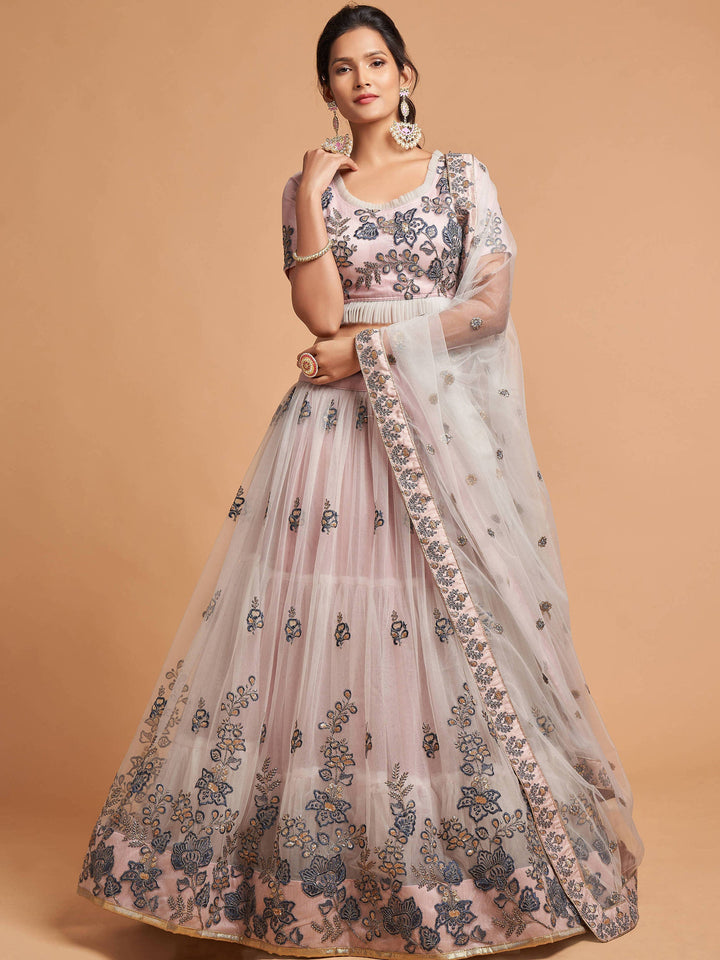 Stylish grey lehenga with intricate thread, zari, and sequins embroidery, ideal for weddings and parties.