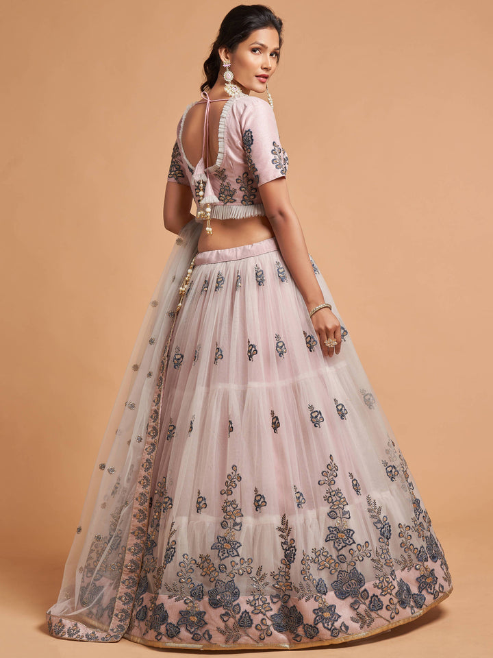 Semi-stitched grey lehenga with customizable choli, ideal for weddings and ceremonies.