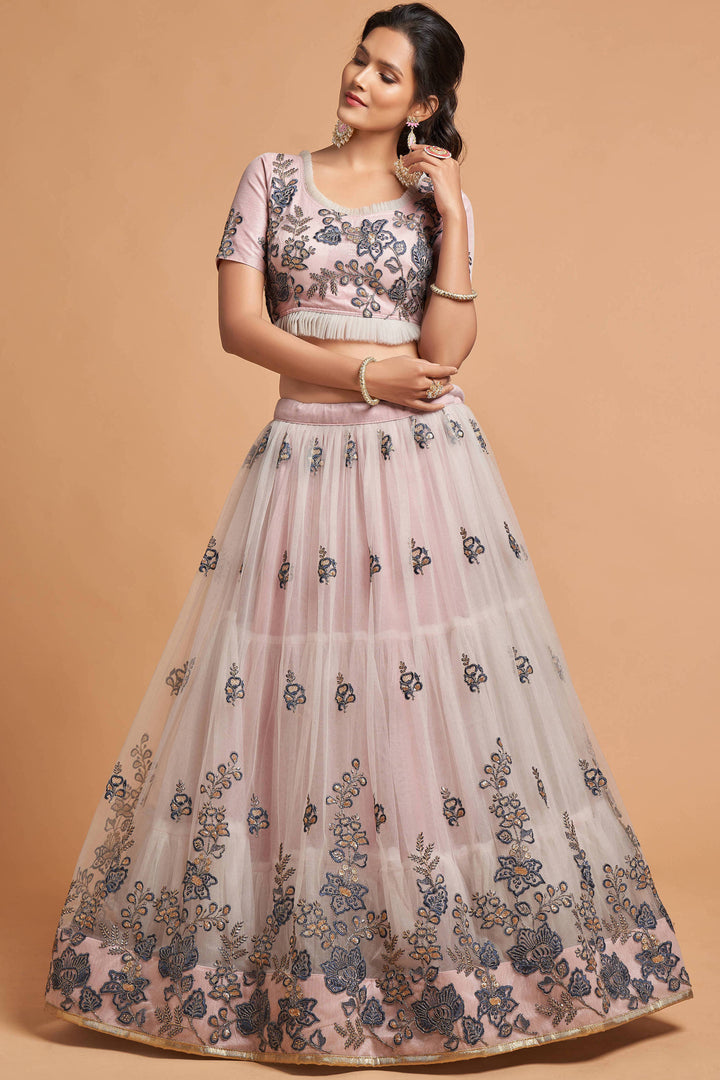 Elegant grey party wear lehenga with soft net blouse and santoon inner, perfect for special events.