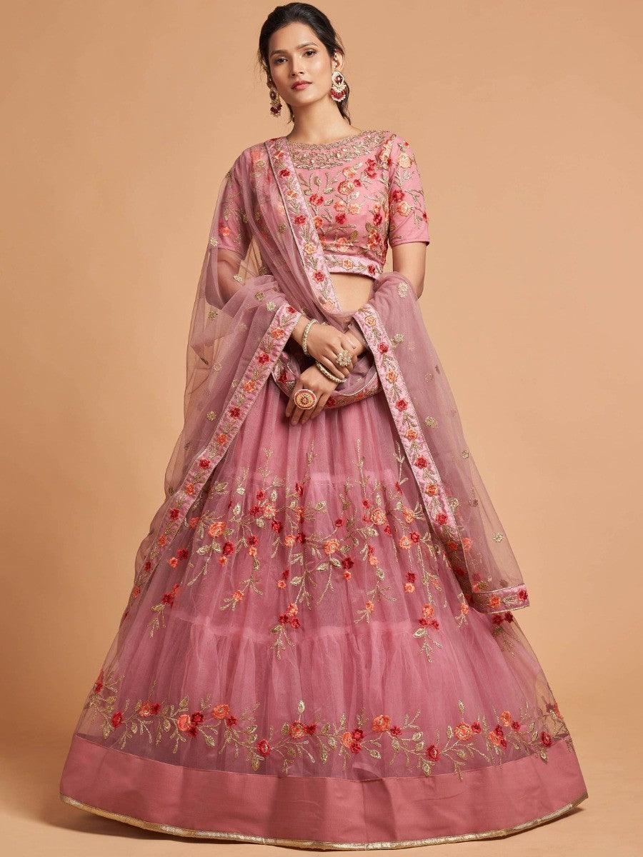 Elegant dusty pink lehenga with intricate zari, Badala, dori, and thread embroidery for parties and weddings.