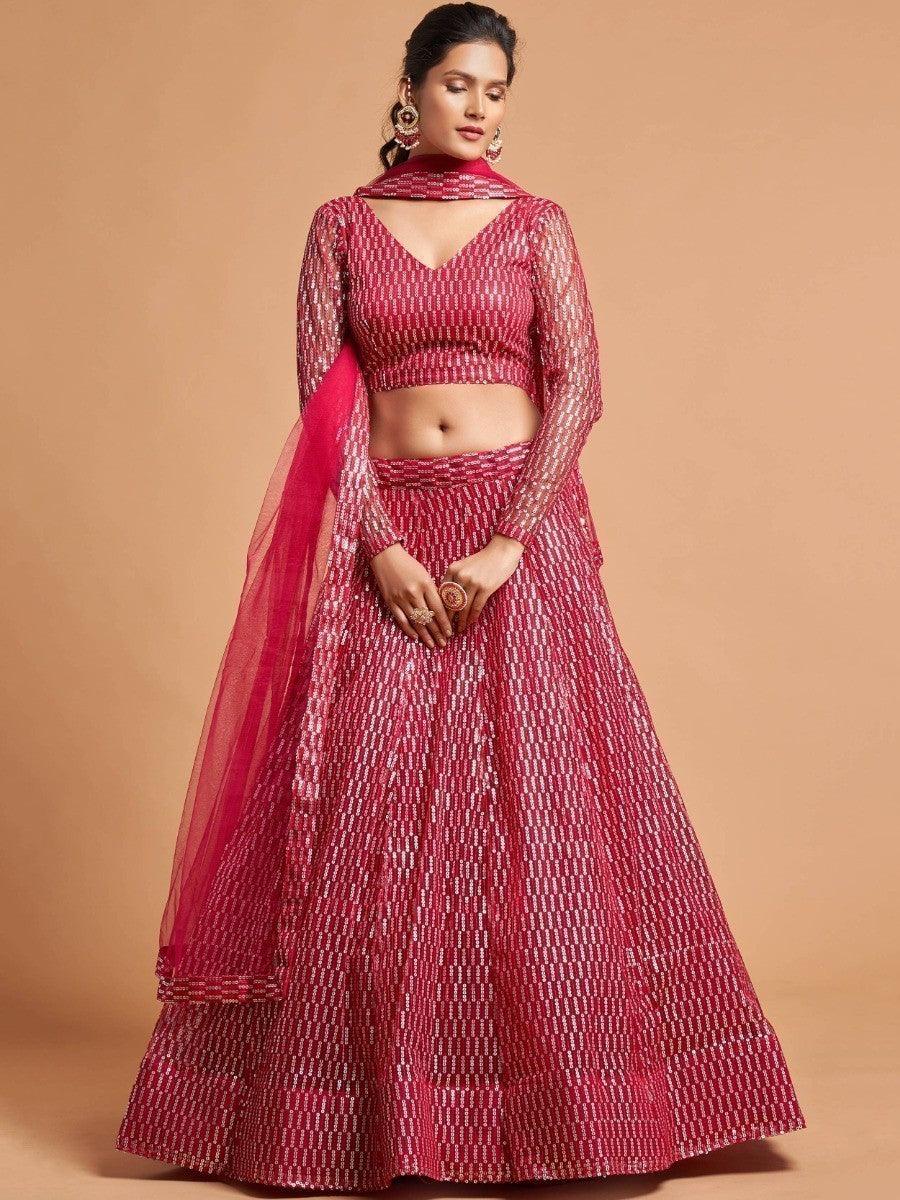 Designer hot pink lehenga choli with soft net blouse and embroidered dupatta.