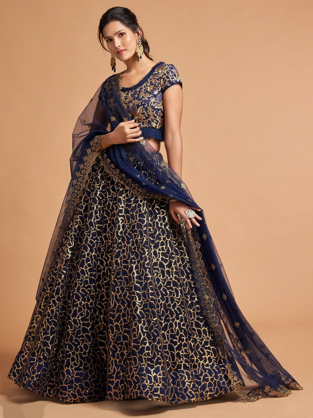 Navy blue lehenga with thread and zari embroidery for weddings and parties.