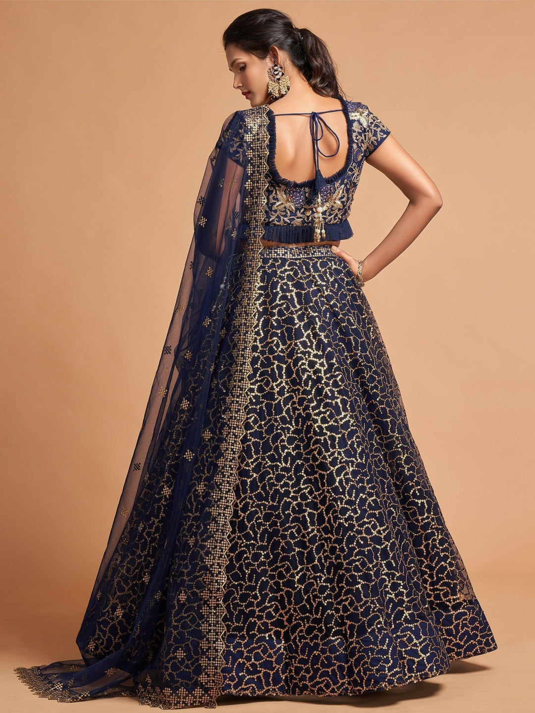 Navy blue lehenga choli with thread embroidery, perfect for weddings.