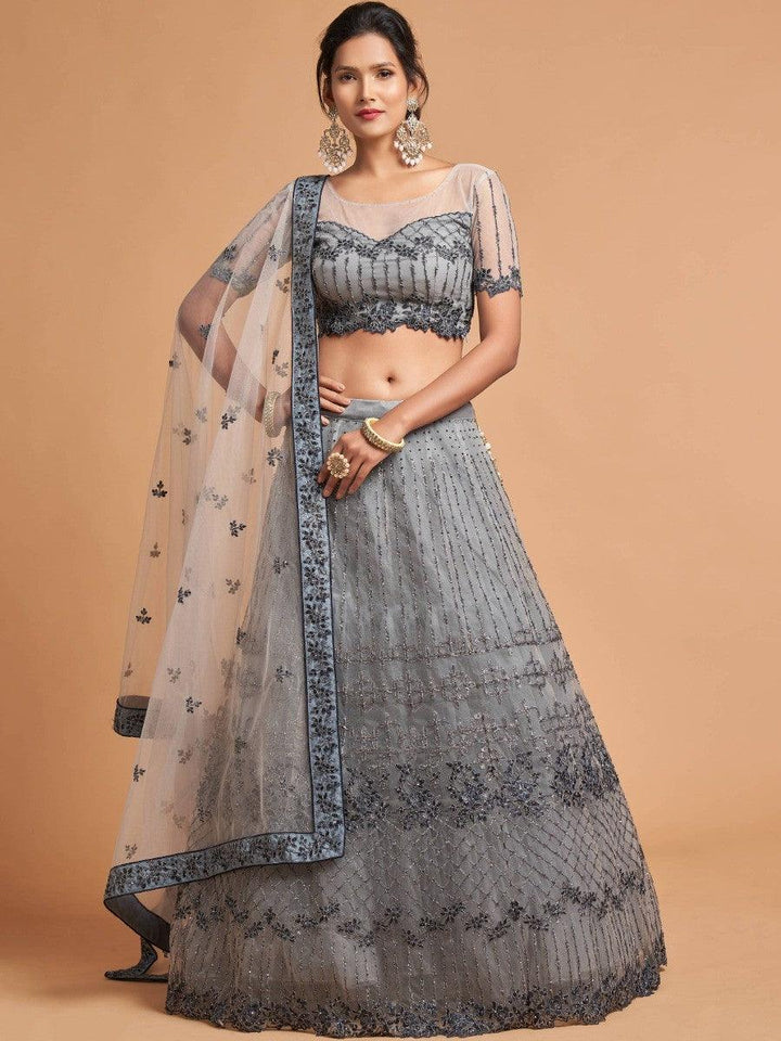 Grey lehenga with thread and zari embroidery for weddings and parties.