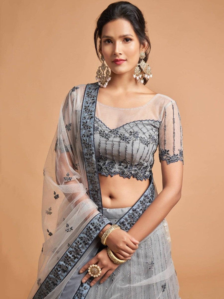 Elegant grey lehenga with embroidered details and attached can-can.