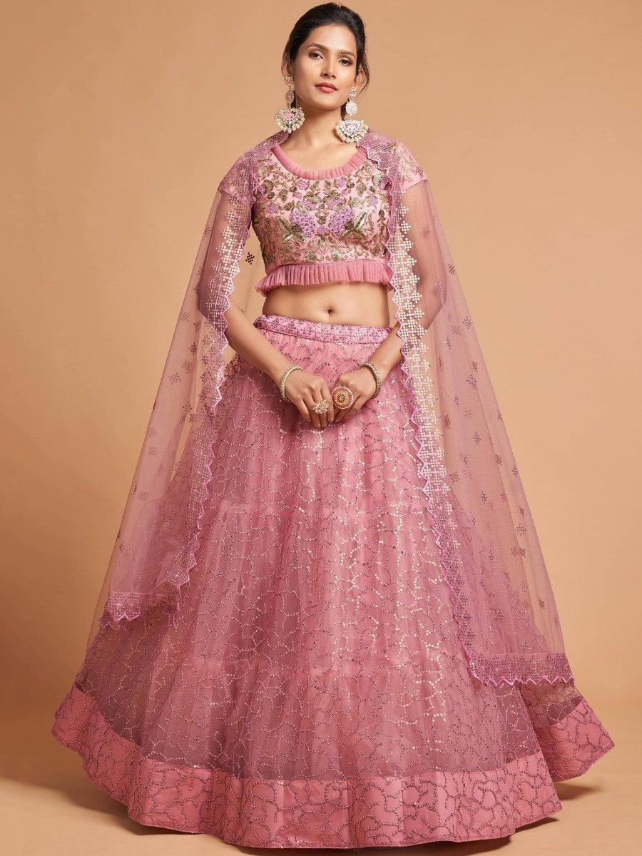 Designer blush pink lehenga choli with matching blouse and dupatta.