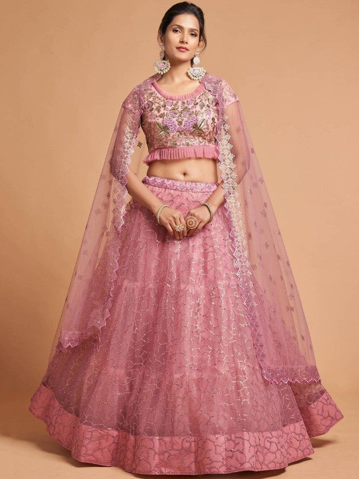 Designer blush pink lehenga choli with matching blouse and dupatta.