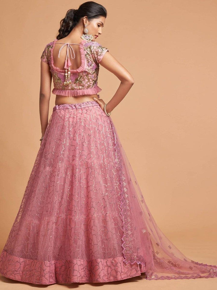 Semi-stitched blush pink lehenga customizable up to 42 inches.