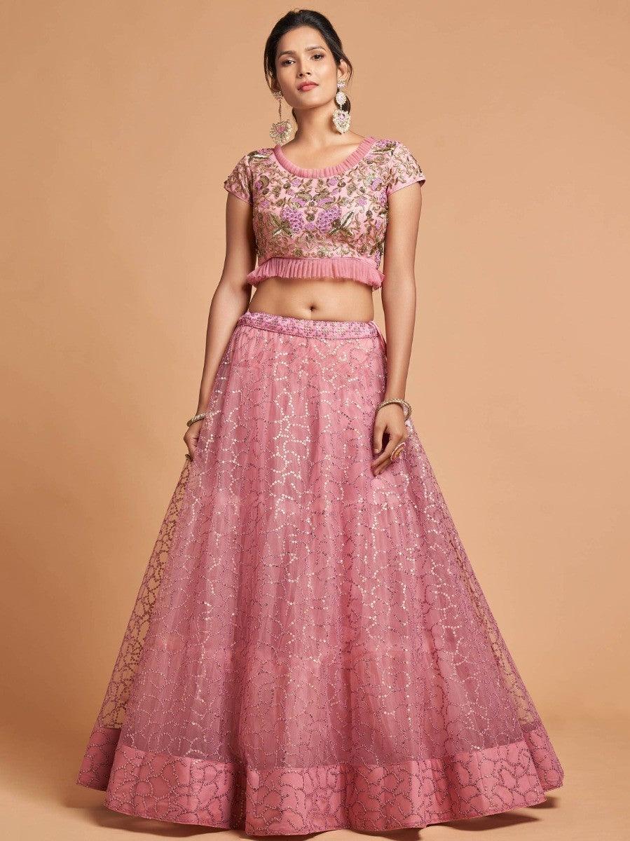 Blush pink wedding lehenga with thread and Badala embroidery.