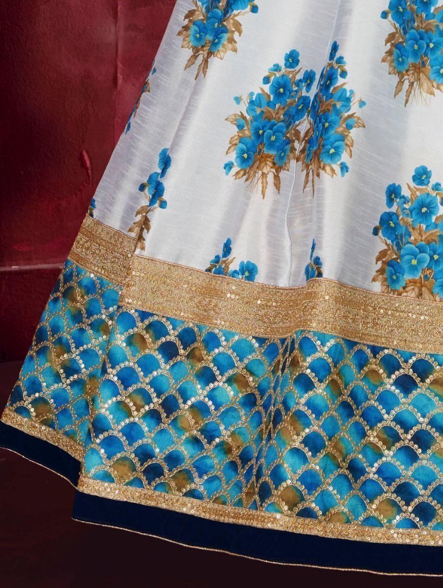 Blue wedding lehenga with floral design and sequins details