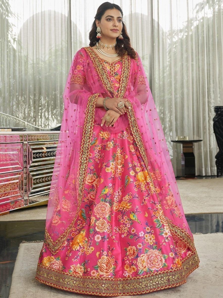 Deep pink lehenga with floral print, stonework, and sequins embellishments.