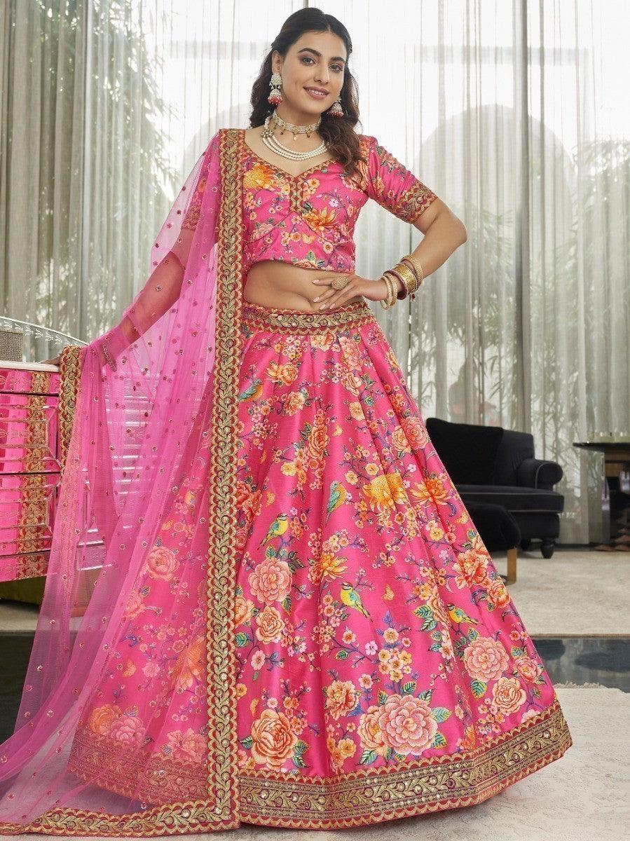 Designer deep pink lehenga choli with embroidered lace border and sequins.