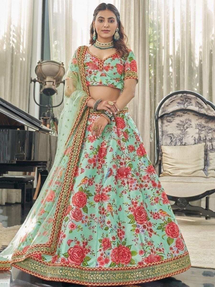 Mint green lehenga with floral print, stonework, and sequins embellishments.