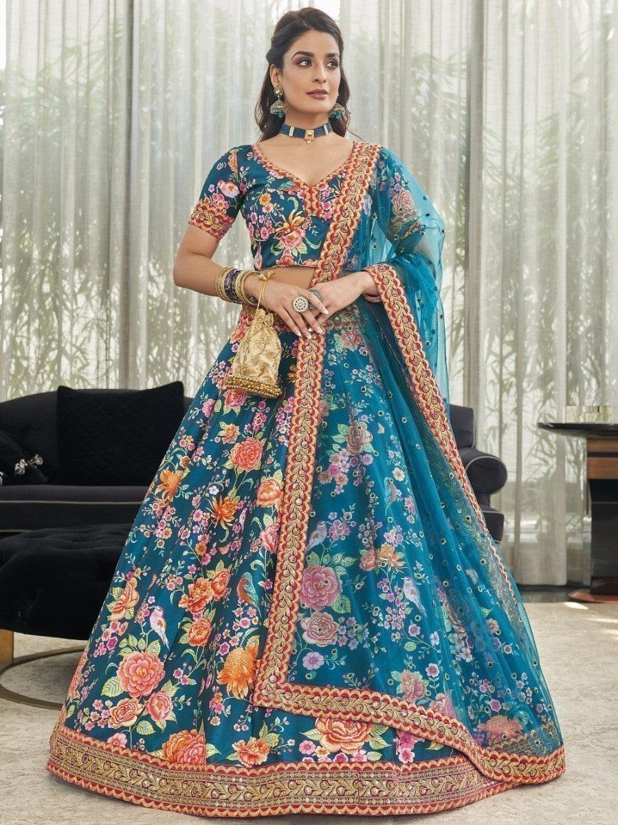 Elegant teal blue lehenga with floral print and stonework for weddings