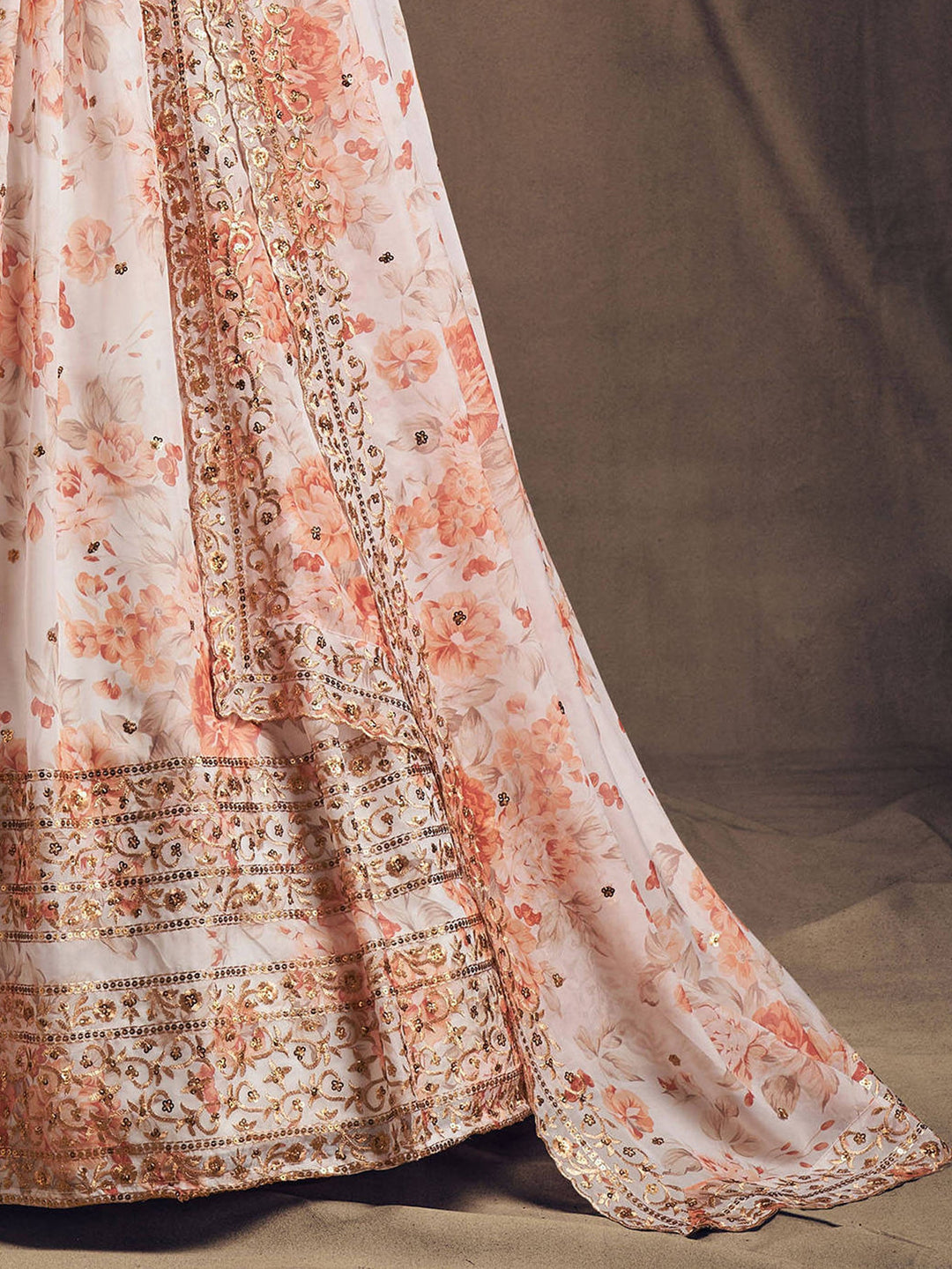 Elegant white lehenga with floral design and sequin embroidery