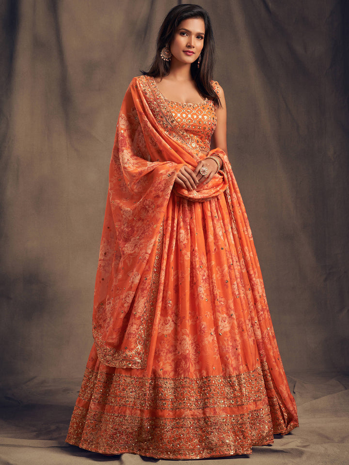 Designer orange lehenga choli with floral print and net dupatta