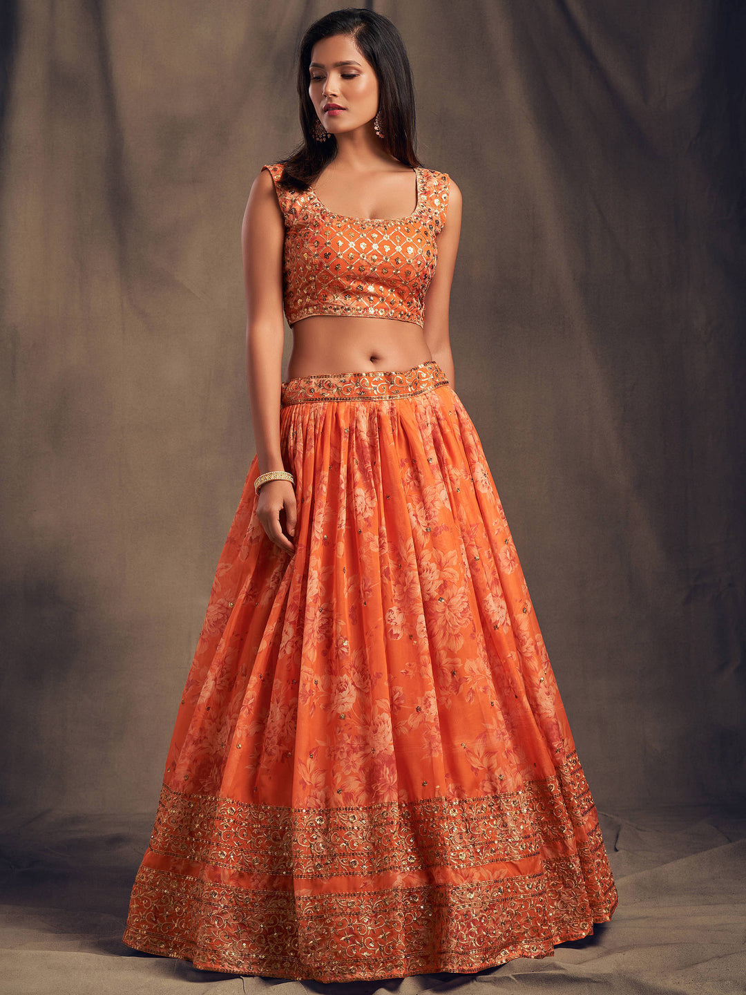 Orange party wear lehenga with embroidered organza fabric