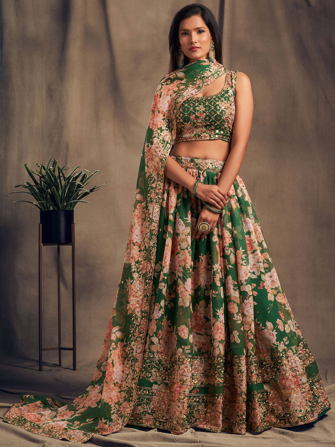 Green floral printed organza lehenga with zari and sequins embroidery