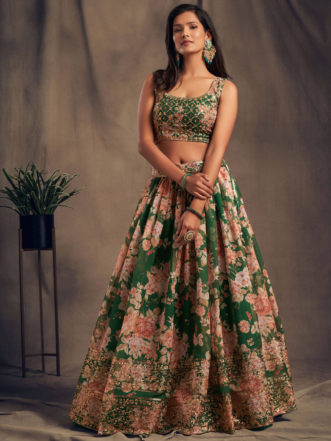 Elegant green lehenga with floral print and intricate embroidery