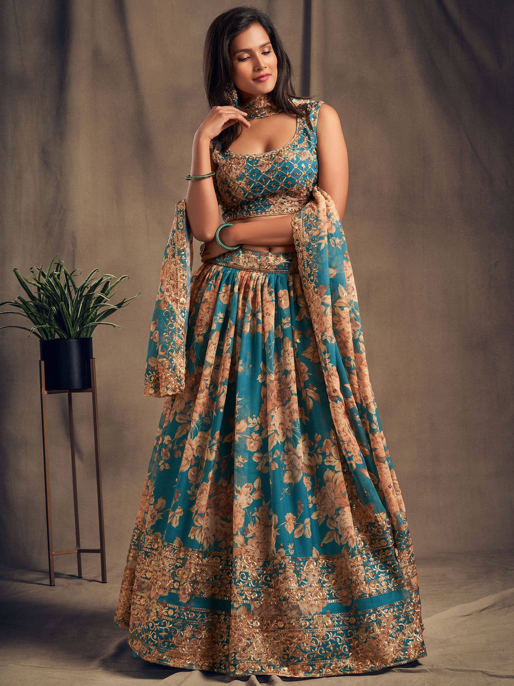 Designer teal blue lehenga choli with matching embroidered dupatta