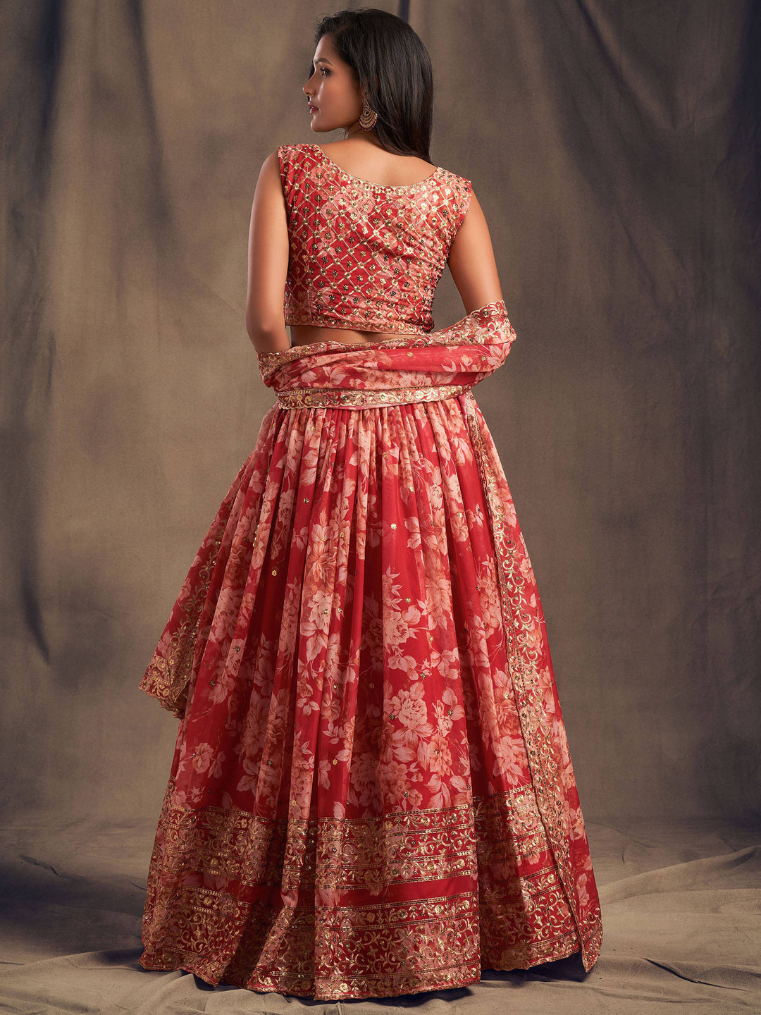 Party wear red lehenga with matching choli and dupatta