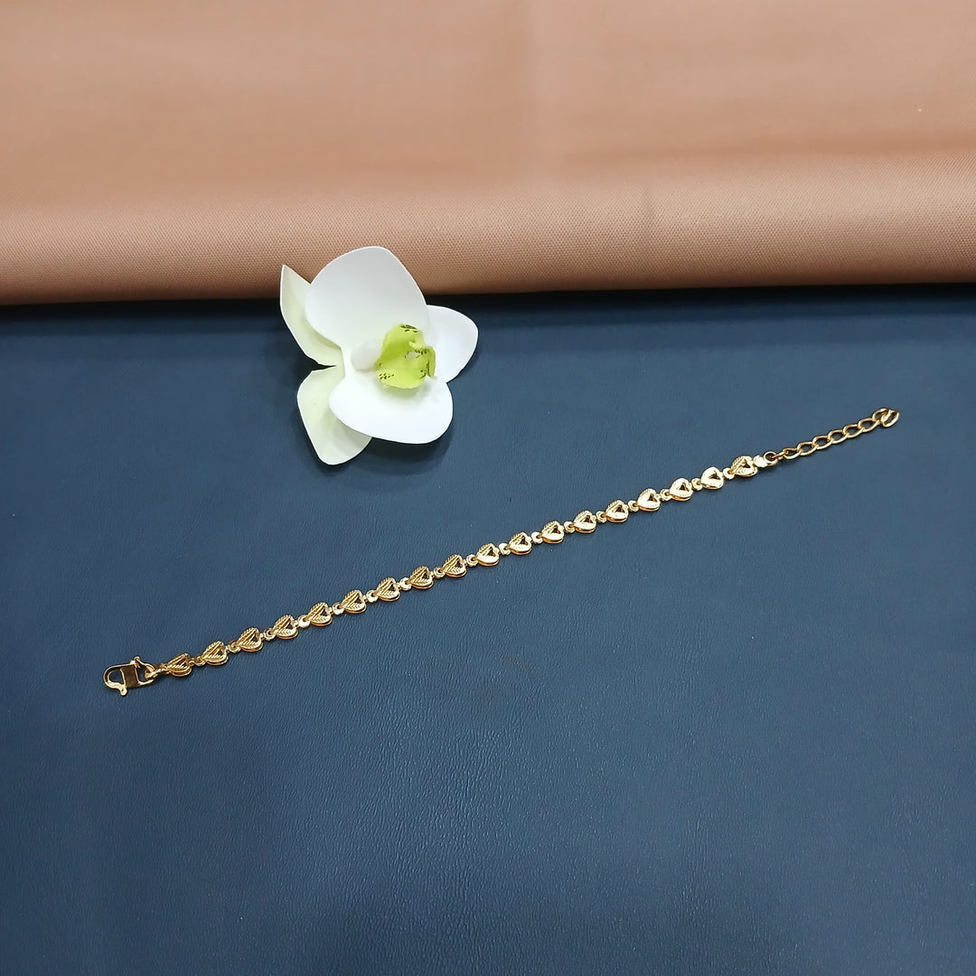 Stylish golden bracelet with a modern twist, suitable for casual wear.