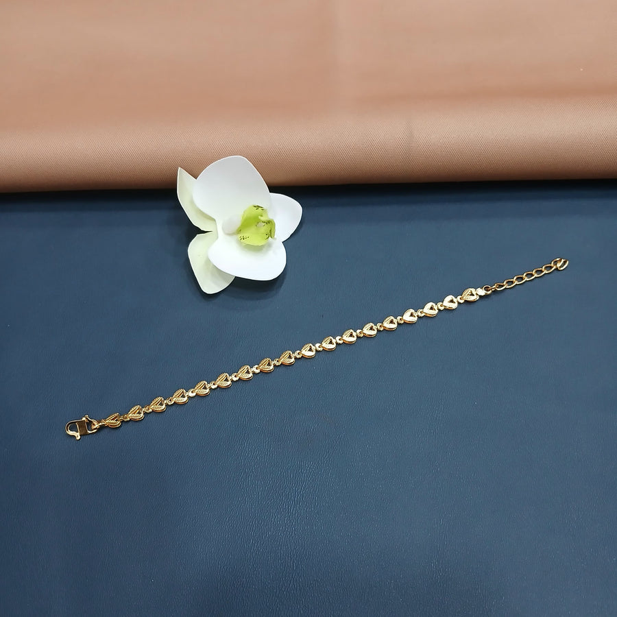 Stylish golden bracelet with a modern twist, suitable for casual wear.