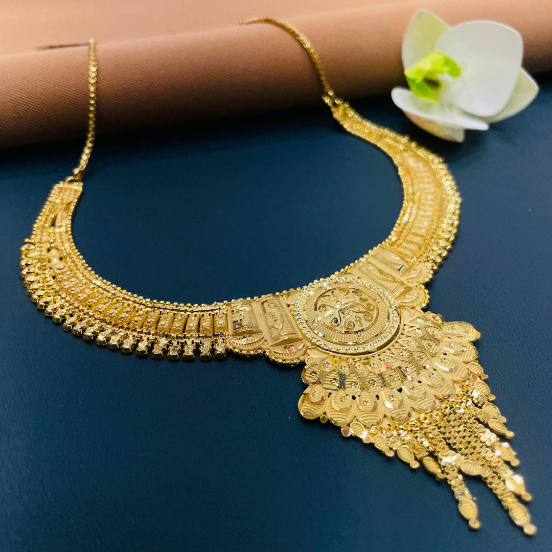 Elegant Indian golden jewelry set, ideal for special celebrations.