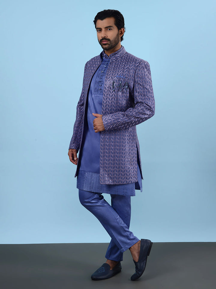 This chic Purple & Blue Indowestern, made from premium Silk Blend fabric and featuring stunning Resham and sequins work, guarantees comfort and elegance at any event in the USA.