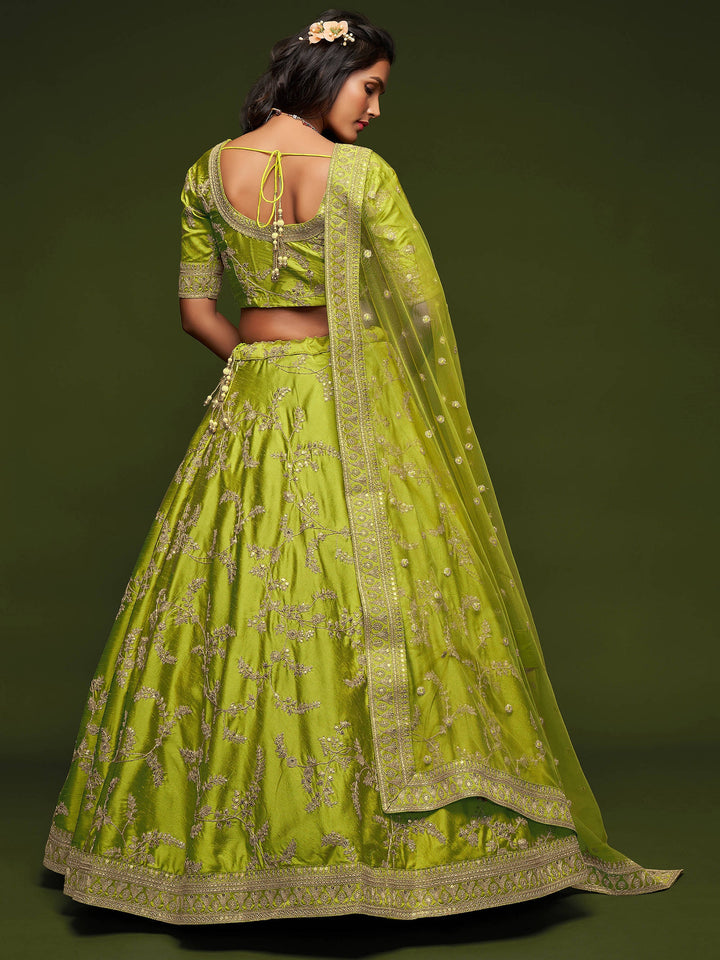 Designer lehenga with attached can-can for wedding receptions.