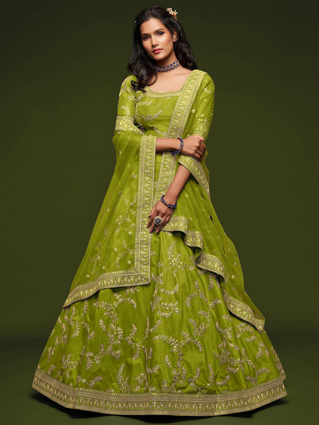 Bridal lehenga for women with matching choli and net dupatta.