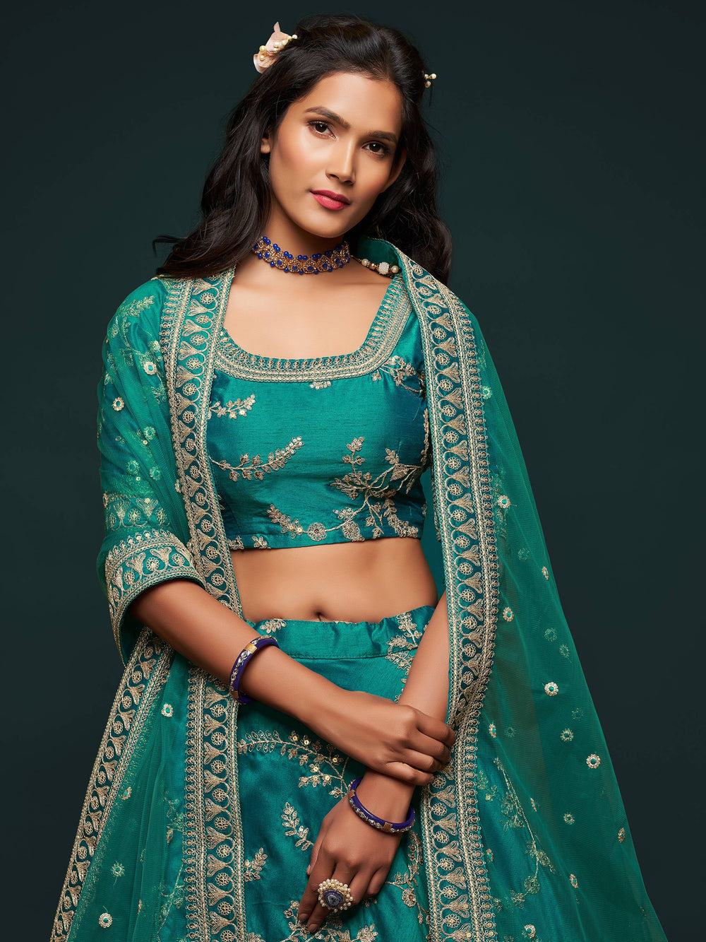 Art silk green lehenga choli with net dupatta and lace detailing