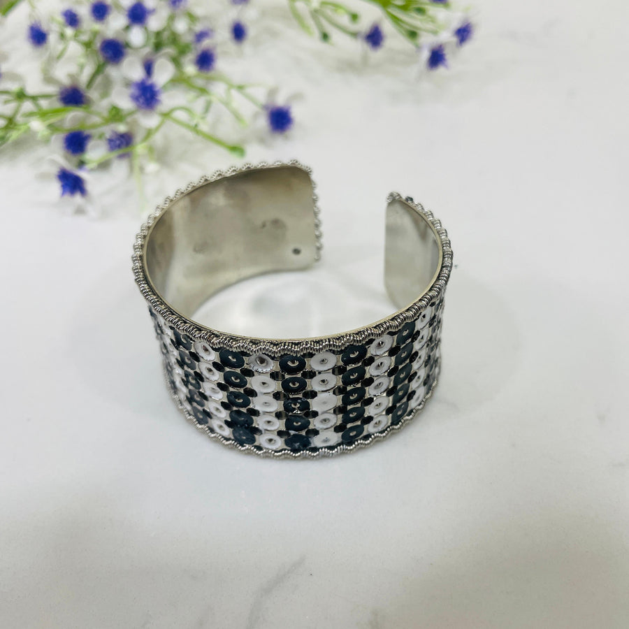 Sophisticated oxidised bangle set with unique textures, perfect for any occasion.