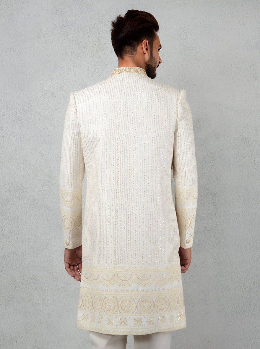 The ten-button closure and intricate embroidery add sophistication to your wedding attire.