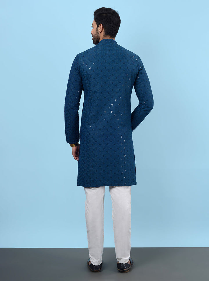 Experience sophistication with the elegant design of this Blue Kurta Pajama.