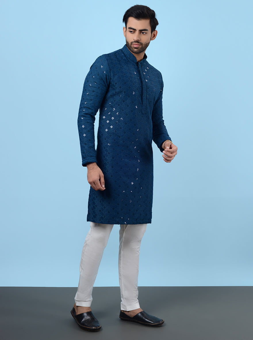 Ideal for celebrations, this Blue Kurta Pajama combines luxury with comfort.