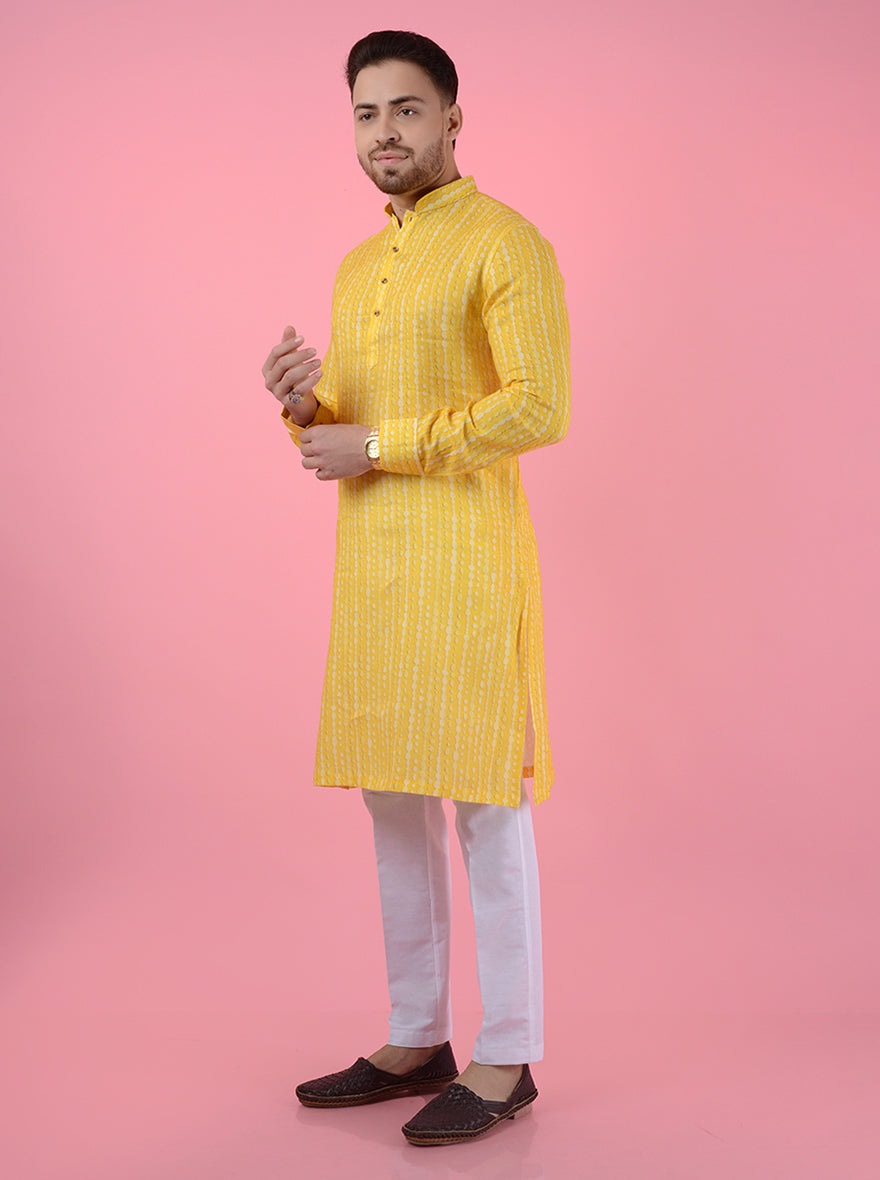 Yellow linen kurta pajama set for men, featuring a mandarin collar for a refined ethnic look.