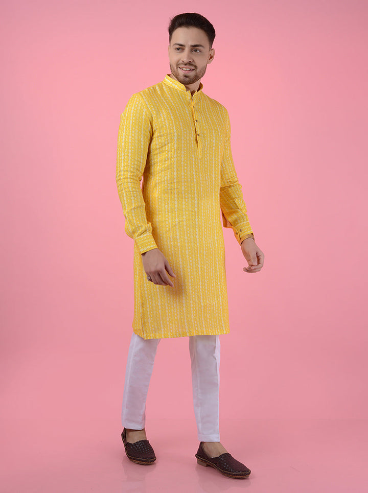 Elegant yellow linen kurta pajama for men with full sleeves and mandarin collar, ideal for festive wear.