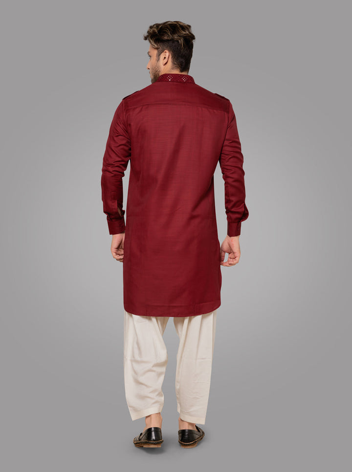 Discover the charm of our embroidered Pathani silk blend kurta, ideal for special events.