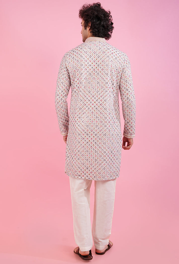 Cream kurta pajama with intricate embroidery, perfect for USA men’s special occasions.