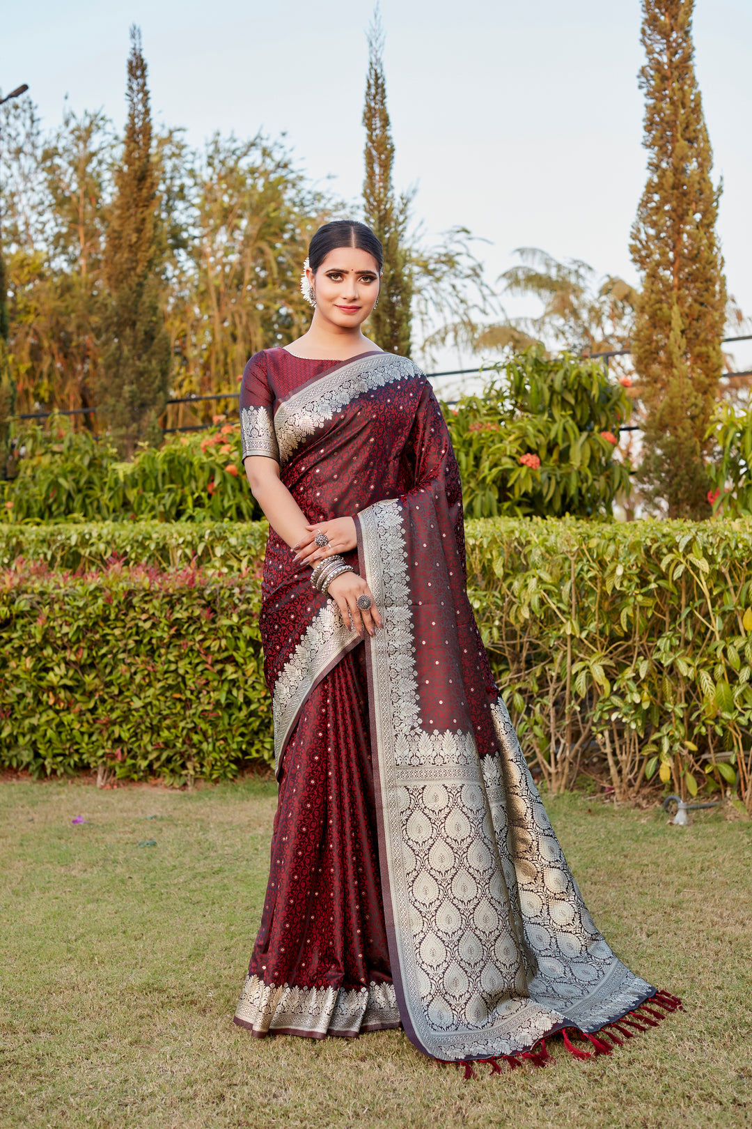 Premium Wine Kanjivaram Satin Silk Saree featuring exquisite Butta work and elegant designer border.