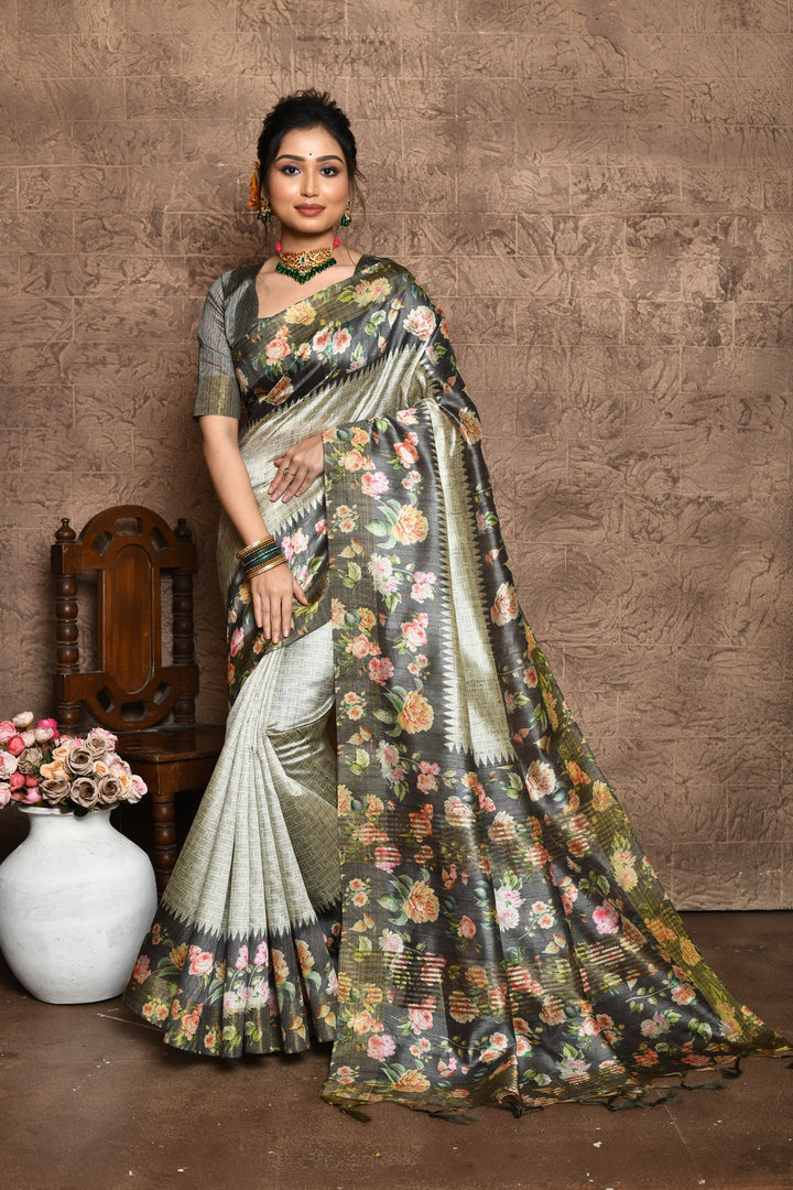 Elegant Tussar silk saree with all-over print, floral pallu, and tassel details